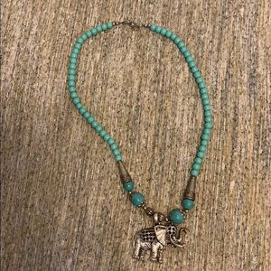 Turquoise beaded necklace with Elephant charm